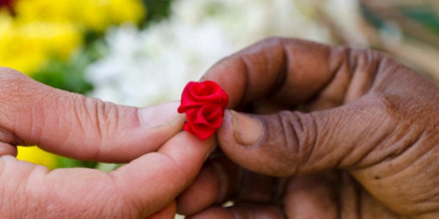 MADURAI, TAMIL NADU, INDIA - 2011/01/07: Little artificial flower given to a tourist for gift as a sign for being welcome. (Photo by Frank Bienewald/LightRocket via Getty Images)