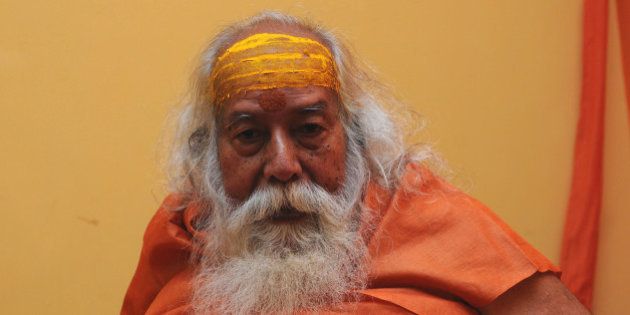BHOPAL, INDIA - OCTOBER 30: (Editors Note: This is an exclusive shoot of Hindustan Times) Shankaracharya Swami Swaroopanand Saraswati during an interview with Hindustan Times, on October 30, 2015 in Bhopal, India. Sharpening his attack on Sai Baba, Shankaracharya Swami Swaroopanand Saraswati in Bhopal on Friday released a poster in which Lord Hanuman is shown driving out the revered spiritual master with a tree trunk. Swami Swaroopanand said that the trust formed on the name of Sai was responsible to spoil Hindu dharma in the country. He also said that Sai Baba was projected superior to lord Hanuman and other Hindu Gods by the trust, which was unacceptable. (Photo by Praveen Bajpai/Hindustan Times via Getty Images)
