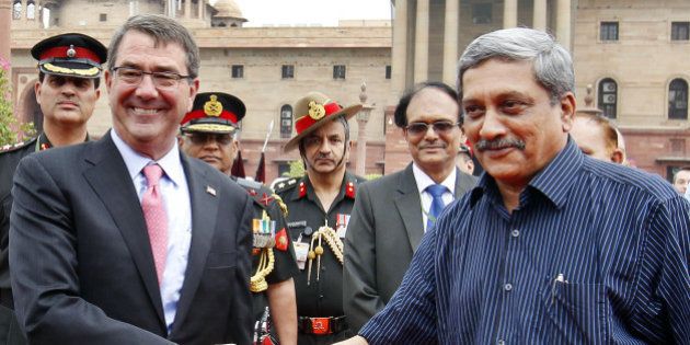 NEW DELHI, INDIA - JUNE 3: US Defense Secretary Ashton Carter shakes hand with Defence Minister Manohar Parikkar at South Block on June 3, 2015 in New Delhi, India. India and US is expected to sign a new 10-year defence framework, which was decided during the visit of US President Barack Obama in Delhi in January. (Photo by Ajay Aggarwal/ Hindustan Times via Getty Images)