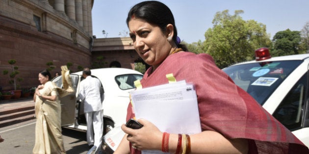 NEW DELHI, INDIA - MARCH 9: Union HRD Minister Smriti Irani at Parliament House on March 9, 2016 in New Delhi, India. Replying to the motion of thanks in the Parliament, Prime Minister Narendra Modi called on the Rajya Sabha to work in tandem with the Lok Sabha in passing important bills. (Photo by Arvind Yadav/Hindustan Times via Getty Images)