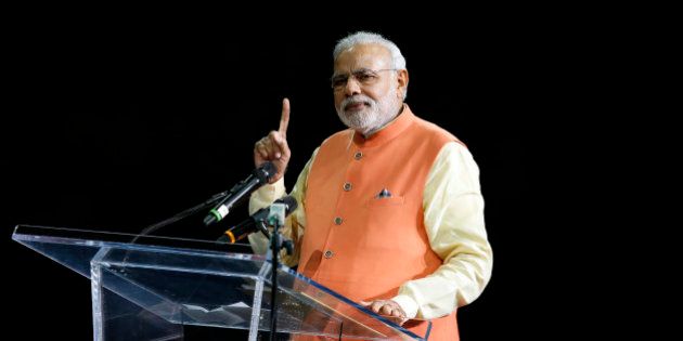 Prime Minister Narendra Modi of India gives a speech during a reception by the Indian community in honor of his visit to the United States at Madison Square Garden, Sunday, Sept. 28, 2014, in New York. (AP Photo/Jason DeCrow)