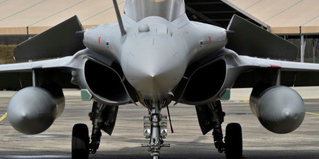 Rafale fighter aircraft stand on the tarmac of the air base of Mont-de-Marsan, southwestern France on March 10, 2016.The minister also met with military staff recently deployed to the Barkhane and Chammal operations. / AFP / GEORGES GOBET (Photo credit should read GEORGES GOBET/AFP/Getty Images)