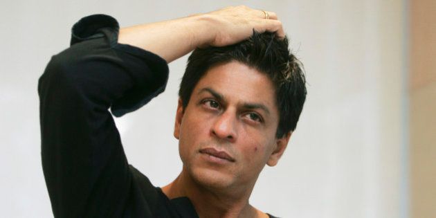 Bollywood actor Shah Rukh Khan gestures during an interview with The Associated Press at his residence in Mumbai, India, Monday, Dec. 8, 2008. Khan, one of the biggest stars in the world's biggest movie industry, wept at a recent movie preview for Mumbai's shattered sense of security after militants laid waste to it in a bloody three-day attack. (AP Photo/Gautam Singh)