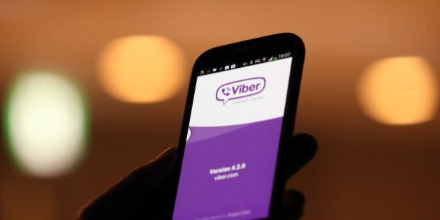 The Viber Internet messaging and calling service application is displayed on a smartphone in this arranged photograph taken in Tokyo, Japan, on Friday, Feb. 14, 2014. Rakuten Inc., the Japanese online retailer controlled by billionaire Hiroshi Mikitani, is buying the Viber Internet messaging and calling service for $900 million as it moves into social networking. Photographer: Tomohiro Ohsumi/Bloomberg via Getty Images