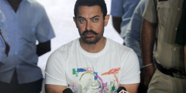 MUMBAI, INDIA MARCH 14: Aamir Khan celebrates his 51th birthday with the media at his residence at Bandra in Mumbai.(Photo by Milind Shelte/India Today Group/Getty Images)