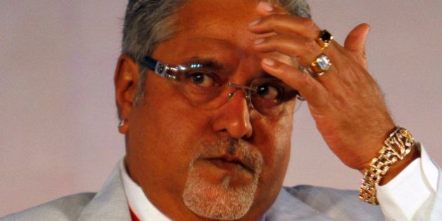 United Breweries Group Chairman Vijay Mallya looks on during the Global Investors Meet organized by the Karnataka state government in Bangalore, India, Thursday, June 3, 2010. The southern state which is home to India's Silicon Valley aims to attract business investment with this two day event that began Thursday. (AP Photo/Aijaz Rahi)