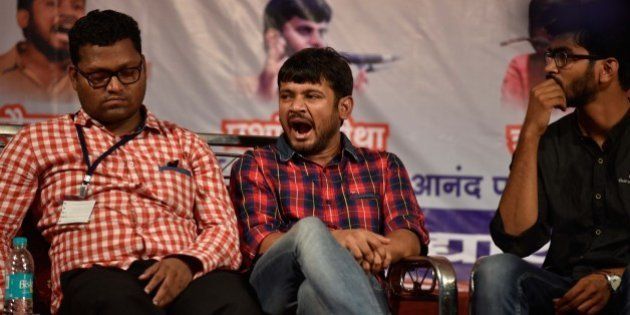 MUMBAI, INDIA - APRIL 23: JNU Students Union leader Kanhaiya Kumar with Zuhail K.P. (R), Hyderabad University students union President during a Joint Students Youth Assembly against discrimination and attacks on Universities, at Adarsh Vidyalaya in Tilak Nagar on April 23, 2016 in Mumbai, India. Kumar said. At the convention we will create a draft of the Rohith Act and pass it in a student parliament. After which we shall fight to get it passed by our national Parliament, he said. The student leader was arrested on sedition charges on February 12 after allegedly raising anti-India slogans at the JNU campus. He was given bail after police failed to produce any evidence to back the charge (Photo by Arijit Sen/Hindustan Times via Getty Images)
