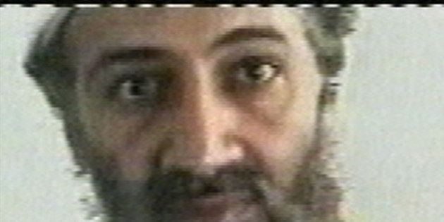 FILE - This undated image taken from video released by Al-Jazeera television on Oct. 5, 2001, shows Osama bin Laden at an undisclosed location. Federal authorities dropped terrorism charges against bin Laden in court papers filed Friday, June 17, 2011, formally ending a case against the slain al-Qaida leader that began with hopes of seeing him brought to justice in a civilian court. U.S. District Judge Lewis Kaplan approved a request made by federal prosecutors to dismiss the charges â a procedural move that's routine when defendants under indictment die. (AP Photo/Courtesy of Al-Jazeera via APTN, File)