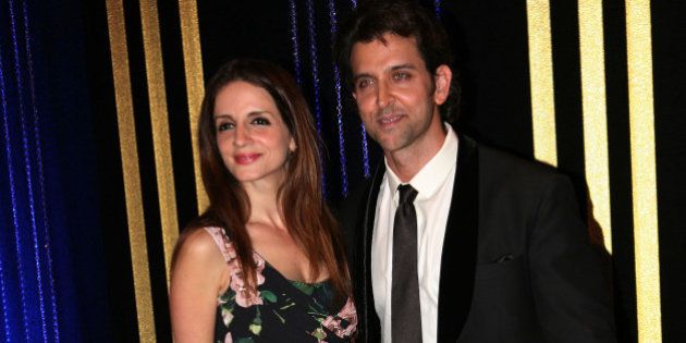 MUMBAI, INDIA - SEPTEMBER 6: Bollywood actor Hrithik Roshan with his wife Sussanne Roshan during the 64th birthday celebrations of actor turned producer Rakesh Roshan at Blue Sea, Worli Seaface on September 6, 2013 in Mumbai.(Photo by Milind Shelte/India Today Group/Getty Images)