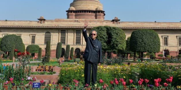 Indian President Pranab Mukherjee poses in the Mughal Gardens at the President's House in New Delhi on February 11, 2016. AFP PHOTO / Chandan KHANNA / AFP / Chandan Khanna (Photo credit should read CHANDAN KHANNA/AFP/Getty Images)