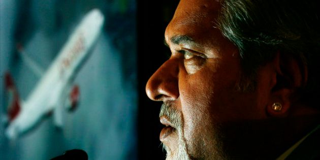 Kingfisher Airlines Chairman Vijay Mallya speaks during a news conference about the new Kingfisher Airlines service between London and Bangalore in southern India, in London September 4, 2008. REUTERS/Luke MacGregor (BRITAIN)
