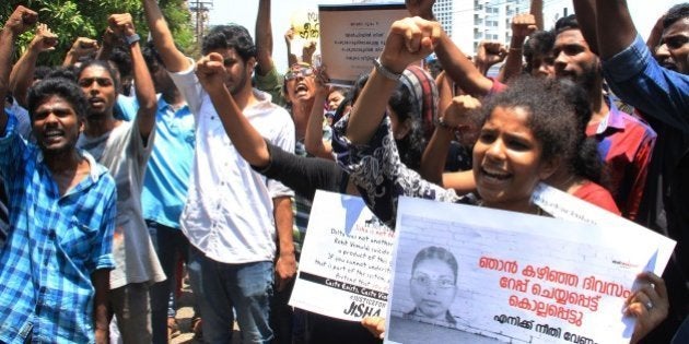 Indian protestors shout slogans during a demonstration against the rape and murder of a woman in Kochi on May 3, 2016. Indian police detained three people May 3 over the brutal rape and murder of a young student in the southern state of Kerala, in a case echoing the 2012 gang-rape of a Delhi woman that sparked mass protests. Police said the attack on the 30-year-old law student from the lowest Dalit caste was so vicious she was found lying dead in a pool of blood, her intestines hanging out. Her mother discovered her body at the family home in the southern state of Kerala. / AFP / STR (Photo credit should read STR/AFP/Getty Images)