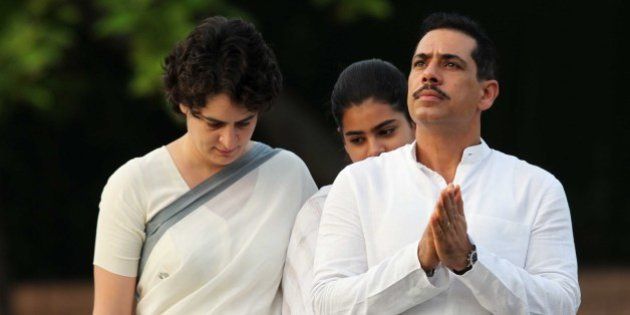 NEW DELHI, INDIA - AUGUST 20: Priyanka Vadra along with her daughter Miraya Vadra and husband Robert Vadra pay tribute to former Indian Prime Minister Rajiv Gandhi on his birth anniversary at his memorial on August 20, 2013 in New Delhi, India. Rajiv Gandhi, who heralded the information and communication technology revolution in the country, was born on August 20, 1944 and served as the sixth Prime Minister of India from 1984-1989. He was assassinated by the LTTE on May 21, 1991 at Sriperumbudur in Tamil Nadu while addressing an election campaign. (Photo by Ajay Aggarwal/Hindustan Times via Getty Images)