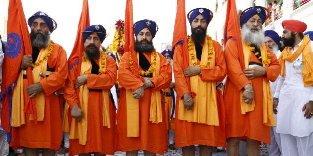 Sikh devotees participate in the Baisakhi festival at Panja Sahib shrine in Hassan Abdel April 13, 2015. Hundreds of Indian Sikh pilgrims arrived into Pakistan to celebrate the Baisakhi festival with Pakistani Sikhs at the shrines of Panja Sahib and Nankana Sahib, the birth place of Sikh faith founder Guru Nanak Dev. REUTERS/Caren Firouz