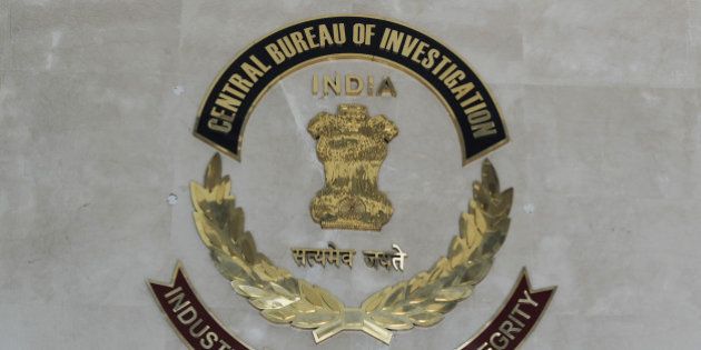 The Indian Central Bureau of Investigation (CBI) logo is pictured at the CBI headquarters in New Delhi on December 3, 2012. The CBI is an Indian governmental agency that jointly serves as a criminal investigation body, national security agency and intelligence agency. AFP PHOTO/ SAJJAD HUSSAIN (Photo credit should read SAJJAD HUSSAIN/AFP/Getty Images)