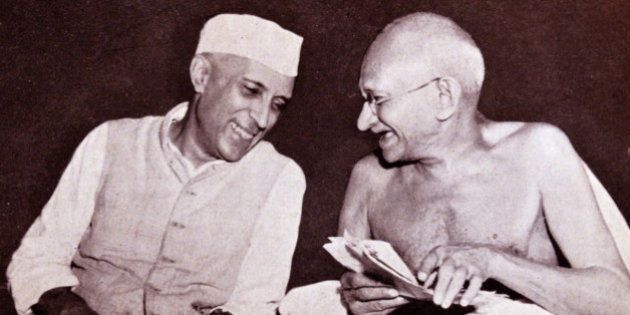 Pandit Jawaharlal Nehru, later Prime Minister of India, (left) with Mohandas Karamchand Gandhi (1869 Â 1948), the preeminent leader of the Indian independence movement in British-ruled India. (Photo by: Universal History Archive/UIG via Getty Images)