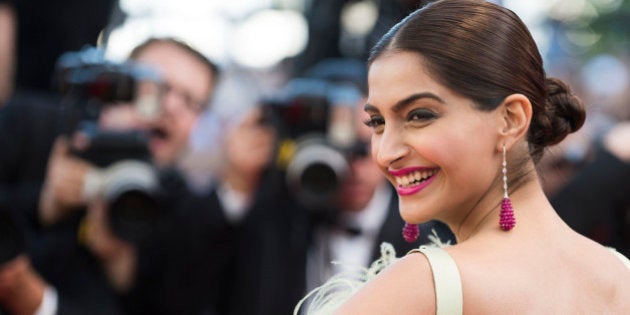 Actress Sonam Kapoor poses for photographers upon arrival for the screening of the film Inside Out at the 68th international film festival, Cannes, southern France, Monday, May 18, 2015. (Photo by Arthur Mola/Invision/AP)