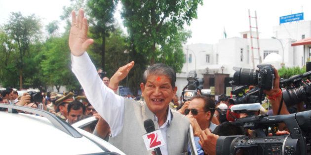 DEHRADUN, INDIA - MAY 10: Uttarakhand former Chief Minister Harish Rawat interacting with media after the floor test outside the assembly, on May 10, 2016 in Dehradun, India. Rawat has claimed victory in the trust vote held today in the Uttarakhand Assembly. The results will be handed over to the Supreme Court in a sealed cover, and the court will declare the results at 10:30 am on Wednesday. (Photo by Vinay Santosh Kumar/Hindustan Times via Getty Images)