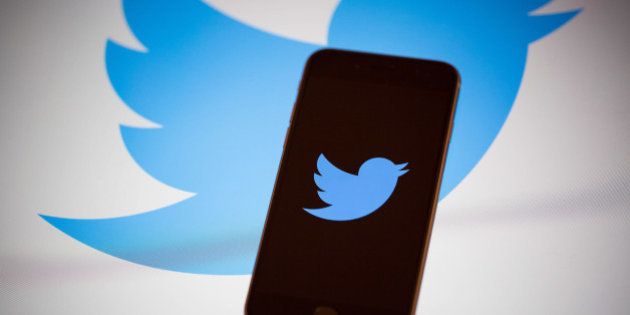 The Twitter Inc. logo is displayed on the screen of an Apple Inc. iPhone 6s in this arranged photograph taken in New York, U.S., on Tuesday, Feb. 9, 2016. Twitter Inc. is changing its timeline to display popular tweets first, instead of the latest posts, a long-anticipated step thats likely to anger its most passionate users. Twitter is scheduled to report quarterly earnings results following the close of U.S. financial markets on February 10. Photographer: Michael Nagle/Bloomberg via Getty Images