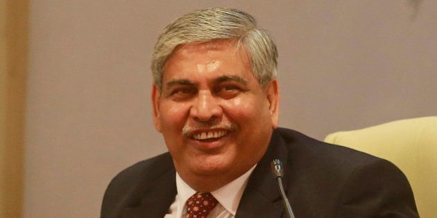 Board of Control for Cricket in India (BCCI)âs newly elected president Shashank Manohar smiles during a press conference in Mumbai, India, Sunday, Oct. 4, 2015. Manohar, a lawyer turned cricket administrator was unanimously elected president of the BCCI Sunday.(AP Photo/Rafiq Maqbool)