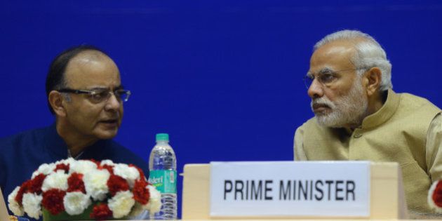 NEW DELHI, INDIA OCTOBER 16: Prime Minister Narendra Modi with Finance Minister Arun Jaitley at the inauguration of the 10th Annual Convention of Central Information Commission, in New Delhi.(Photo by Praveen Negi/India Today Group/Getty Images)
