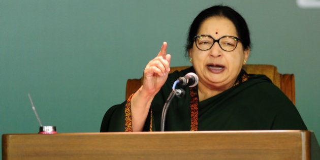 Jayaram Jayalalitha, leader of the Anna Dravida Munnetra Kazhagam (AIADMK) state political party, addresses a campaign rally in Chennai on April 9, 2016.State assembly elections are taking place in the Indian states of Tamil Nadu, West Bengal, Kerala, Pondicherry and Assam in April and May 2016. / AFP / ARUN SANKAR (Photo credit should read ARUN SANKAR/AFP/Getty Images)