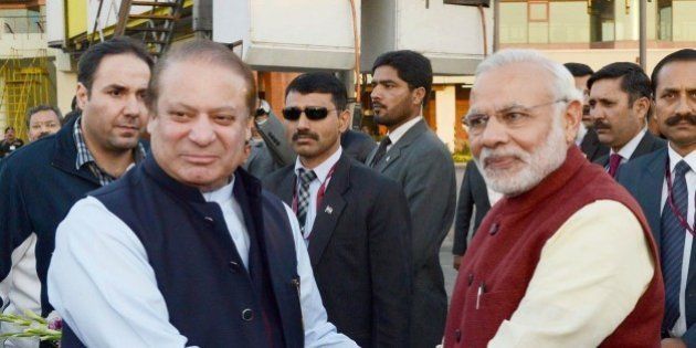 LAHORE, PAKISTAN - DECEMBER 25: Prime Minister of Pakistan Nawaz Sharif (L) shakes hands with Indian Prime Minister Narendra Modi (R) in Lahore, Pakistan on December 25, 2015. (Photo by Pakistan Information Department/Anadolu Agency/Getty Images)