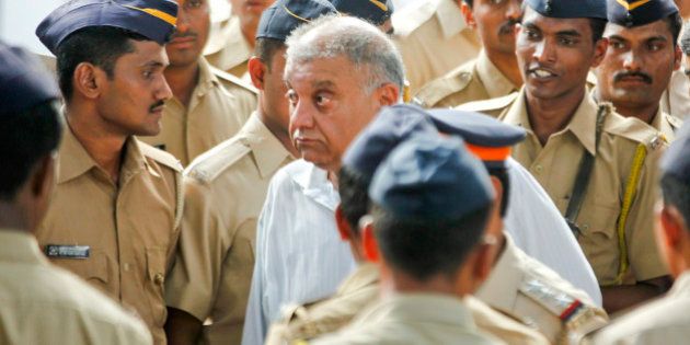 MUMBAI, INDIA - NOVEMBER 20: Former media baron Peter Mukerjea arrested by CBI for murder and criminal conspiracy in the Sheena Bora murder case and taken from CBI office at Nariman Point to Killa court on November 20, 2015 in Mumbai, India. Peter, who is in CBI custody till November 23, is the husband of Indrani, the prime accused and mother of Sheena Bora in the case. (Photo by Anshuman Poyrekar/Hindustan Times via Getty Images)