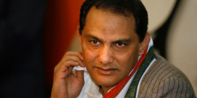 Former Indian cricket captain Mohammed Azharuddin speaks to the media after announcing his decision to join politics in New Delhi, India, Thursday, Feb.19, 2009. Azharuddin joined Indiaâs ruling Congress party Thursday. (AP Photo/Manish Swarup)