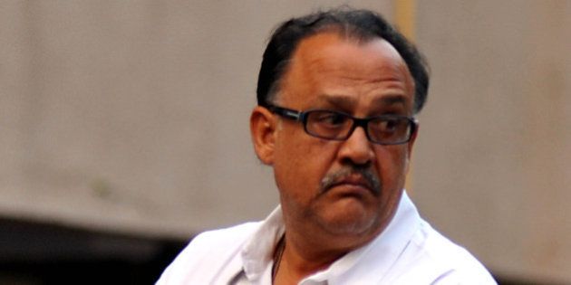 Indian Bollywood actor Alok Nath attends a memorial prayer for late Bollywood actor Farooq Sheikh in Mumbai on December 30, 2013. Sheikh died of a heart attack late December 27 in Dubai where he was on holiday. He was 65. AFP PHOTO/STR (Photo credit should read STRDEL/AFP/Getty Images)