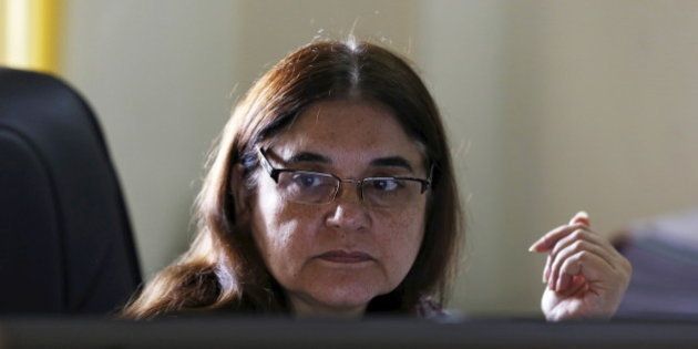 Indiaâs Women and Child Welfare minister Maneka Gandhi, works on a computer before an interview with Reuters at her office in New Delhi, India, October 19, 2015. India's main program to fight child malnutrition has been hit by budget cuts that make it difficult to pay wages of millions of health workers, a cabinet minister said on Monday in a rare public criticism of Prime Minister Narendra Modi's policies. Gandhi, the women and child welfare minister who oversees a scheme to feed more than 100 million poor people, said the current budget was only enough to pay salaries of her 2.7 million health workers until January.