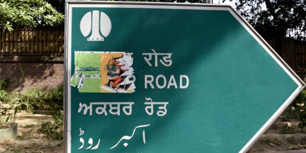 NEW DELHI, INDIA - MAY 16: Posters that had a photo of Maharana Pratap along with the name Maharana Pratap Road pasted on the signage of Akbar Road by some miscreants on May 16, 2016 in New Delhi, India. Some rightwing organizations are raising demand for renaming the road from Akbar Road to Maharana Pratap. Maharana Pratap, a 16th-century ruler of Mewar, is known for his fight against the Mughals, especially emperor Akbar. In September 2015, the NDMC, amid protests, changed the name of Aurangzeb Road to APJ Abdul Kalam Road. The proposal was floated by BJP MP Mahesh Giri. (Photo by Arvind Yadav/Hindustan Times via Getty Images)