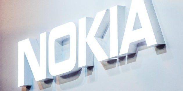 BARCELONA, SPAIN - FEBRUARY 22: A logo sits illuminated outside the Nokia pavilion on the opening day of the World Mobile Congress at the Fira Gran Via Complex on February 22, 2016 in Barcelona, Spain. The annual Mobile World Congress hosts some of the world's largest communications companies, with many unveiling their latest phones and wearables gadgets. (Photo by David Ramos/Getty Images)