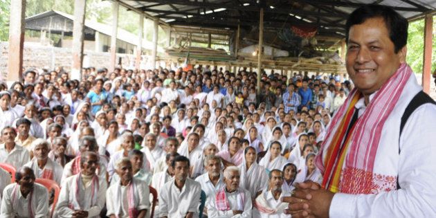 MAJULI, ASSAM - APRIL 1: Union Minister and BJP's Chief Ministerial candidate in Assam Sarbananda Sonowal addressing an election campaign at Mishing village on April 1, 2016 in Majuli, India. The legislative assembly election will be held in two phases on April 4 and 11 2016 to elect members of the 126 constituencies in Assam. (Photo by Subhendu Ghosh/Hindustan Times via Getty Images)