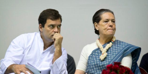 Congress party President Sonia Gandhi, right, and her son and Vice President Rahul Gandhi listen to a speaker during celebrations marking the 125th birth anniversary of the first Indian Prime Minister Jawaharlal Nehru in New Delhi, India, Thursday, Nov. 13, 2014. Nehru is the great-grandfather of Rahul Gandhi. His birth anniversary falls on Nov. 14. (AP Photo/Saurabh Das)