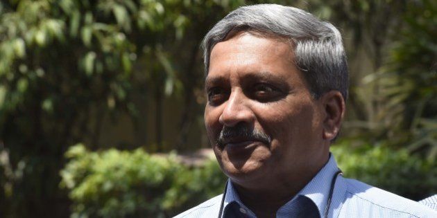 NEW DELHI, INDIA - APRIL 25: Union Defence Minister Manohar Parrikar after attending the first day of the second half of the budget session at the Parliament House, on April 25, 2016 in New Delhi, India. Rajya Sabha adjourned till Tuesday after uproar by the opposition over the Uttarakhand issue. Opposition raised slogans of 'Loktantra ki hatya bandh karo' (Stop the murder of democracy) in the House. The issue of imposition of Presidentâs rule in Uttarakhand today echoed in Parliament with Congress members in both Houses storming the Well and party leader Mallikarjun Kharge staging a dharna in the Lok Sabha. (Photo by Sonu Mehta/Hindustan Times via Getty Images)