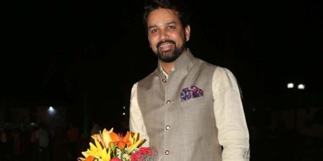 NEW DELHI, INDIA - APRIL 4: BCCI secretary Anurag Thakur during a party hosted to congratulate singer Malini Awasthi on her recent Padma honour, at BSF Officers Mess Lawn, Nizamuddin on April 4, 2016 in New Delhi, India. The evening began with Awadhi folk song and dance performance followed by singer Sunanda Sharma's soulful semi-classical performance. Apart from enjoying the performances, the guests were heard discussing the soaring Delhi heat and the Panama Papers. (Photo by Prabhas Roy/Hindustan Times via Getty Images)