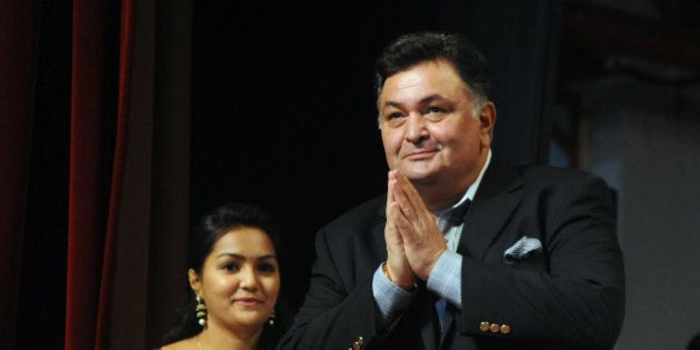 Indian Bollywood actor Rishi Kapoor attends the live concert celebrating 50 years of Bollywood play back singer Amit Kumars musical career, in Mumbai on December 9, 2015. AFP PHOTO / AFP / STR (Photo credit should read STR/AFP/Getty Images)