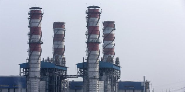 The 1500 Megawatt Combined Cycle Power Station Bawana operated by Pragati Power Corp. (PPCL) stands in Bawana, Delhi, India on Tuesday, May 3, 2016. About 25 kilometers (16 miles) northwest of Prime Minister Narendra Modi's office in New Delhi, a $780 million gas-fired electricity plant that could reduce the choking pollution in India's capital is operating at a fraction of its potential. The facility ran at about a sixth of capacity on Monday, while a much older, belching coal plant some 15 kilometers southeast of central New Delhi provided the biggest share of the city's power generation. Photographer: Udit Kulshrestha/Bloomberg via Getty Images