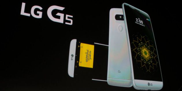 Juno Cho President and CEO of LG Corp. presents the new LG's G5 smartphone during the LG unpacked 2016 event on the eve of this weekâs Mobile World Congress wireless show, in Barcelona, Spain, Sunday, Feb. 21. 2016. (AP Photo/Manu Fernandez)