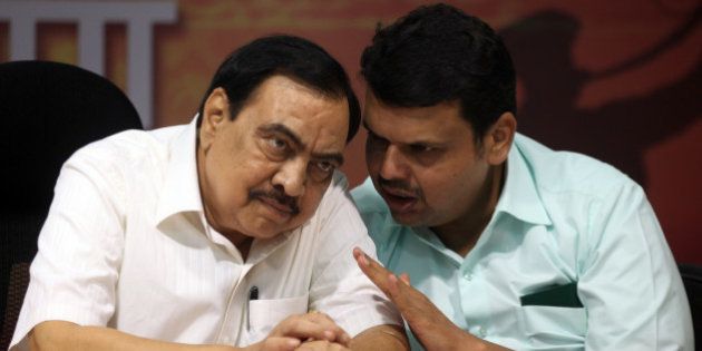 MUMBAI, INDIA - SEPTEMBER 25: BJP leaders Eknath Khadse and Devendra Fadnavis during a press conference on September 25, 2014 in Mumbai, India. The BJP ended its 25-year-old alliance with the Shiv Sena and decided to contest the upcoming Maharashtra Assembly elections with smaller allied parties. (Photo by Kunal Patil/Hindustan Times via Getty Images)