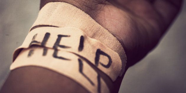 Self-harm wrist covered with bandage