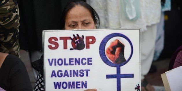 A woman attends a peace protest in Ahmedabad on March 20, 2015, in the wake of the gang-rape on an elderly nun. An Indian state government, West Bengal, was under pressure over the rape of an elderly nun said March 18 it was handing over the case to the country's top investigators after coming under fire over the lack of arrests. AFP PHOTO / Sam PANTHAKY (Photo credit should read SAM PANTHAKY/AFP/Getty Images)