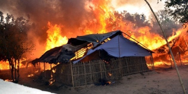 MATHURA, INDIA - JUNE 2: A fire breaks out after clashes between police and encroachers, believed to be of Azad Bharat Vidhik Vaicharik Kranti Satyagrahi, who were being evicted from Jawahar Bagh on June 2, 2016 in Mathura, India. 21 people including two senior police officers died in violence that erupted during a police drive to evict about 3,000 people who had encroached into the Jawahar Bagh Park. The squatters belonged to Azad Bharat Vidhik Vaicharik Kranti Satyagrahi group and claimed to be true followers of Netaji Subhash Chandra Bose have illegally occupied public land from last two years. A cache of arms and several spent bullets of AK-47 assault rifles were seized by police from the site of the deadly clashes. (Photo by Anant Ram/Hindustan Times via Getty Images)