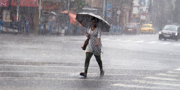 KOLKATA, WEST BENGAL, INDIA - 2016/05/23: Kolkata witnessed good rains during the second half of the day after a hot and humid afternoon. Met department informs that 51mm of rain was recorded in Kolkata this evening. Few streets are water logged due this heavy rain. (Photo by Saikat Paul/Pacific Press/LightRocket via Getty Images)
