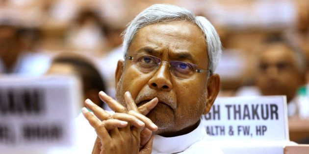 Bihar Chief Minister Nitish Kumar, listens to a speaker during a conference of the chief ministers of various Indian states on Internal Security in New Delhi, India, Wednesday, June 5, 2013. (AP Photo/Saurabh Das)
