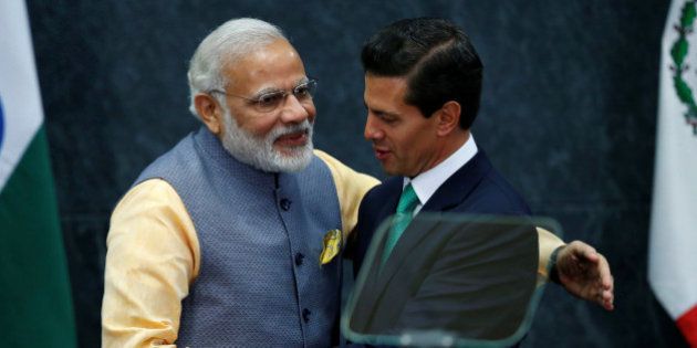 India's Prime Minister Narendra Modi shakes hands with Mexican President Enrique Pena Nieto after they gave a speech, at Los Pinos presidential residence in Mexico City, Mexico, June 8, 2016. REUTERS/Edgard Garrido