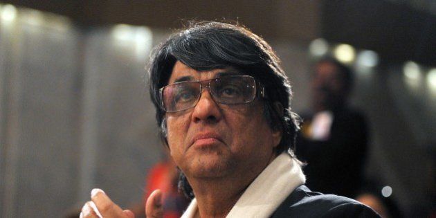 Indian Bollywood actor and director Mukesh Khanna looks on during the first beauty & hair industry Lifetime Achievement Awards in Mumbai on late March 24, 2014. AFP PHOTO / STR (Photo credit should read STRDEL/AFP/Getty Images)