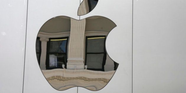 The Apple logo is seen on the side of the new Apple Union Square store Thursday, May 19, 2016, in San Francisco. (AP Photo/Eric Risberg)