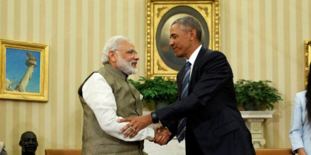 U.S. President Barack Obama (R) shakes hands with India's Prime Minister Narendra Modi after their remarks to reporters following a meeting in the Oval Office at the White House in Washington, U.S. June 7, 2016. REUTERS/Jonathan Ernst